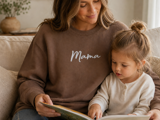 Woman wearing the Mama embroidered sweatshirt in Espresso